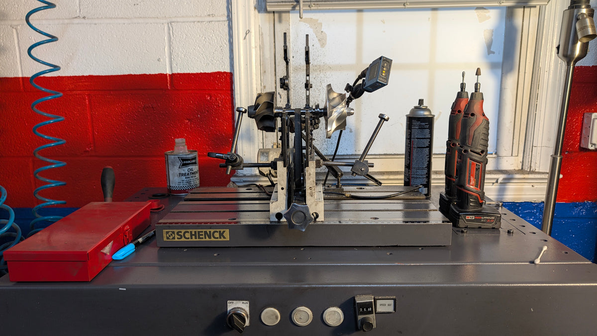 Turbocharger rotating assembly on a Schenck balancing machine at Turbo Time
